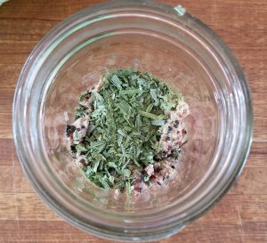 meat and herbs in pint jar